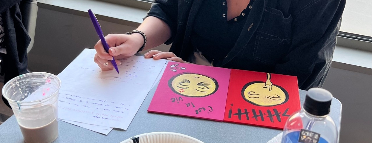A University of Cincinnati DAAP Horticulture student investigates plants