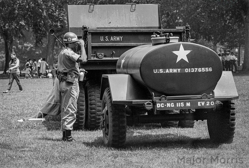 Salutation on lawn of reflecting pool