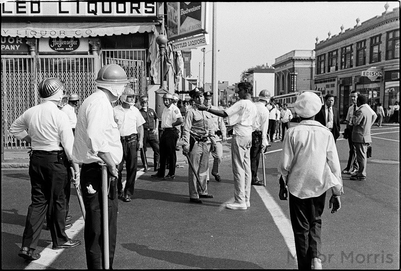 Police and crowd on street