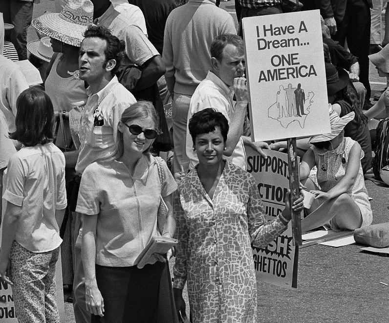 Holding I have a dream sign