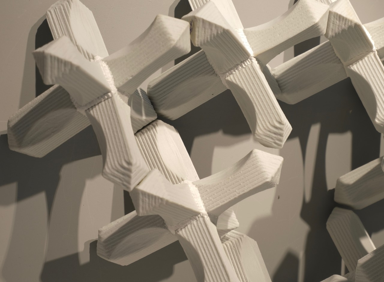 Slip cast porcelain shapes stacked on epoxy board