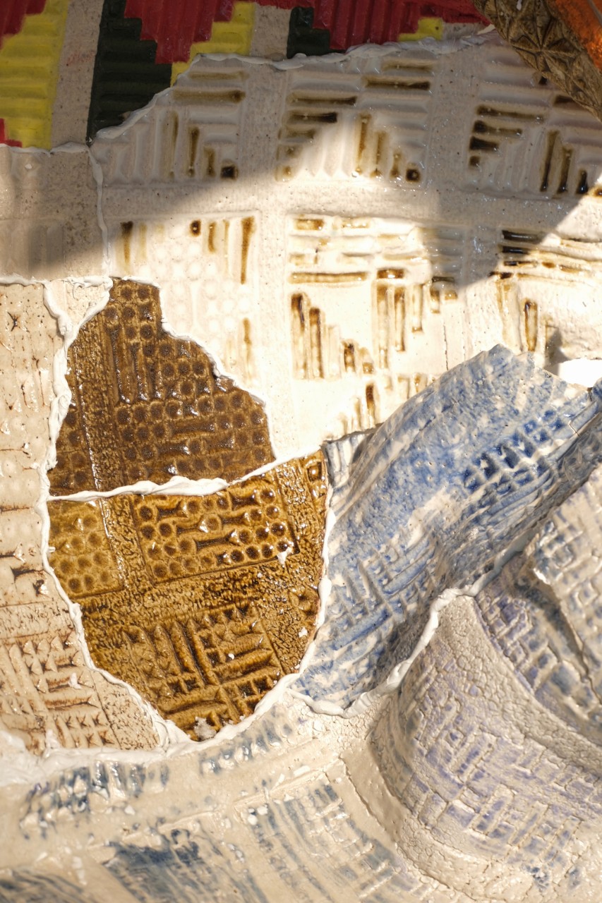 Stoneware, quilted pieces of printed cloth of clay