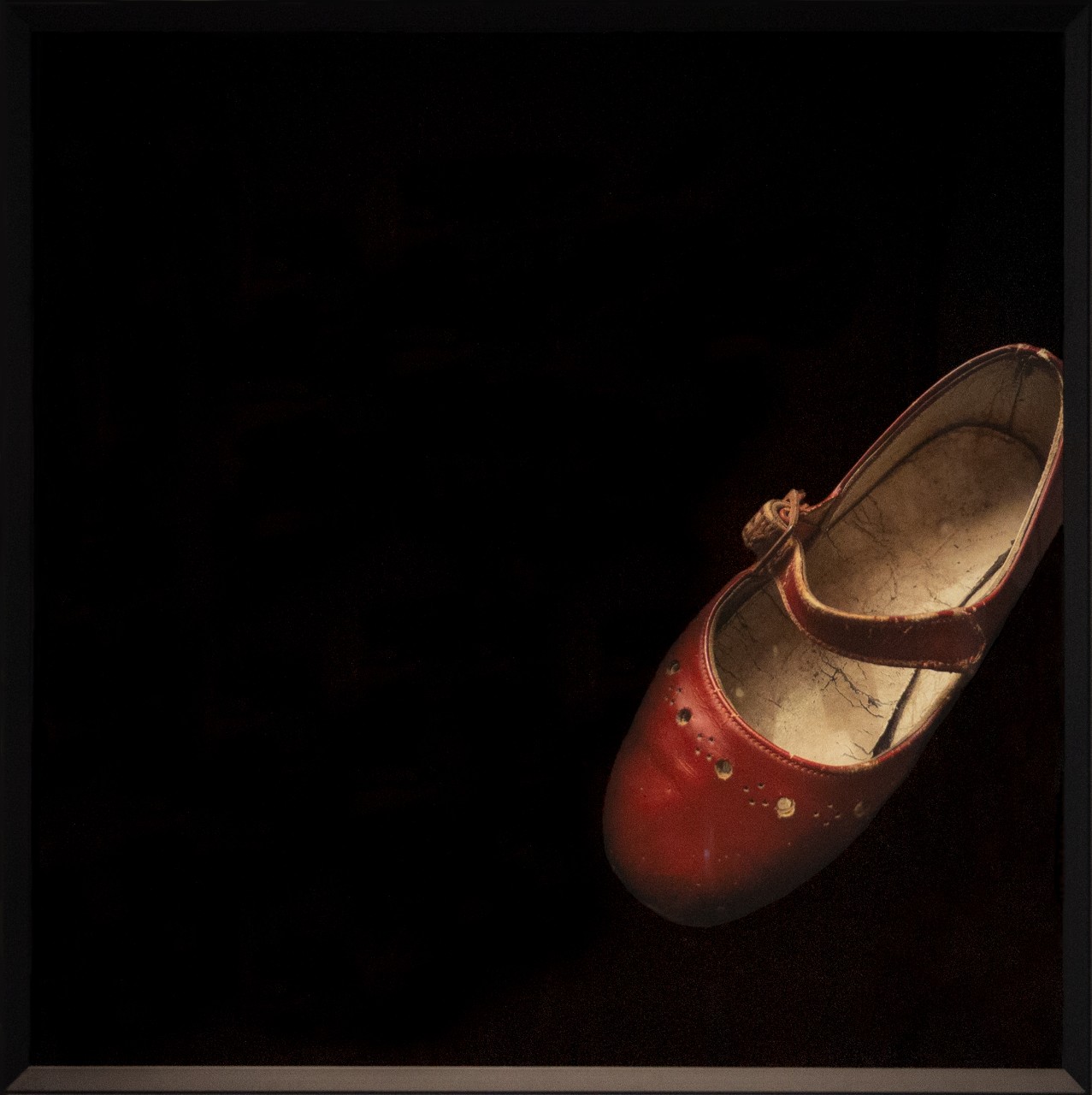 Picture of a red child's shoe