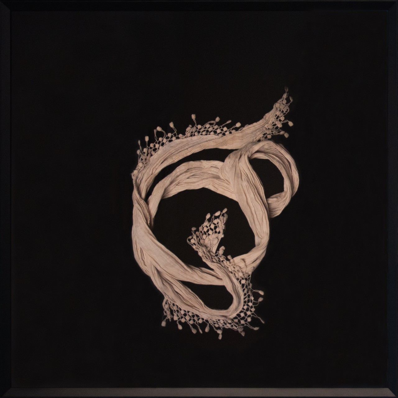 Image of a white fabric scarf