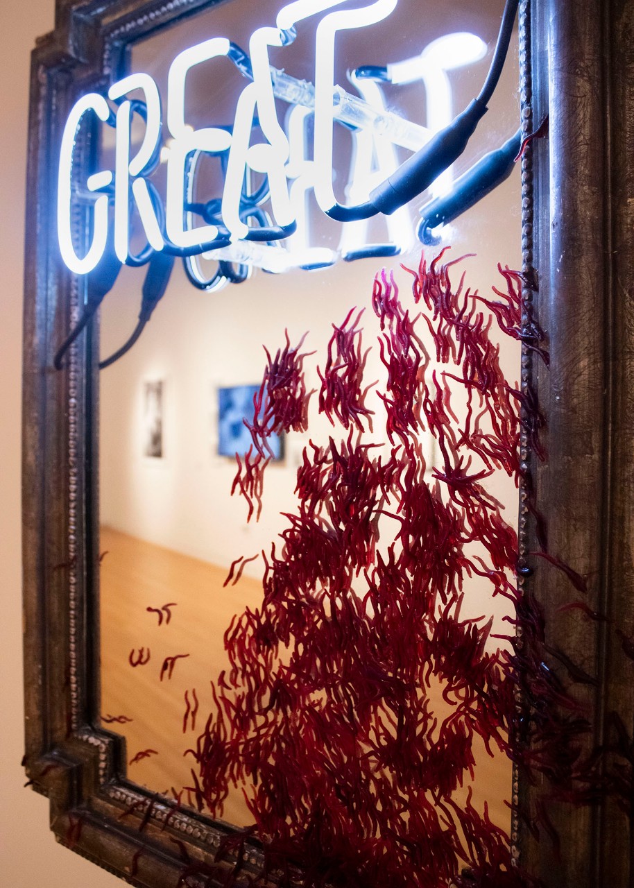 Salvaged neon, reclaimed plastic fishing worms