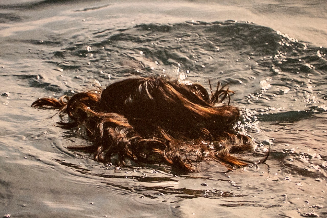 Salvaged neon, reclaimed plastic fishing worms