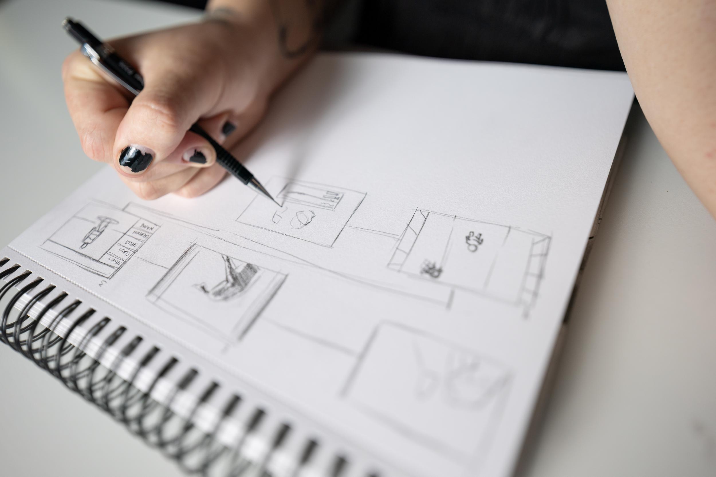 Games and Animation student sketching out a concept.